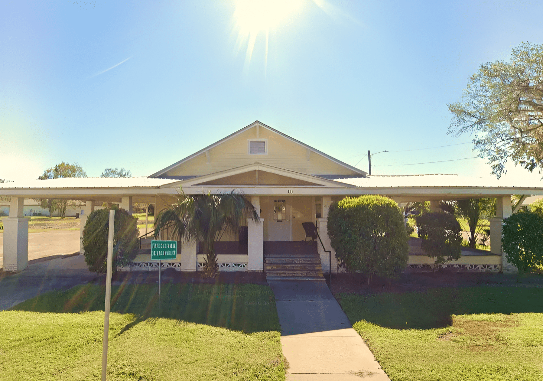 Sunny day, house with driveway